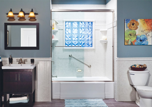 Modern bathroom with blue walls and shower.