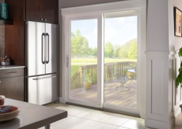 Kitchen with sliding glass door to patio view.