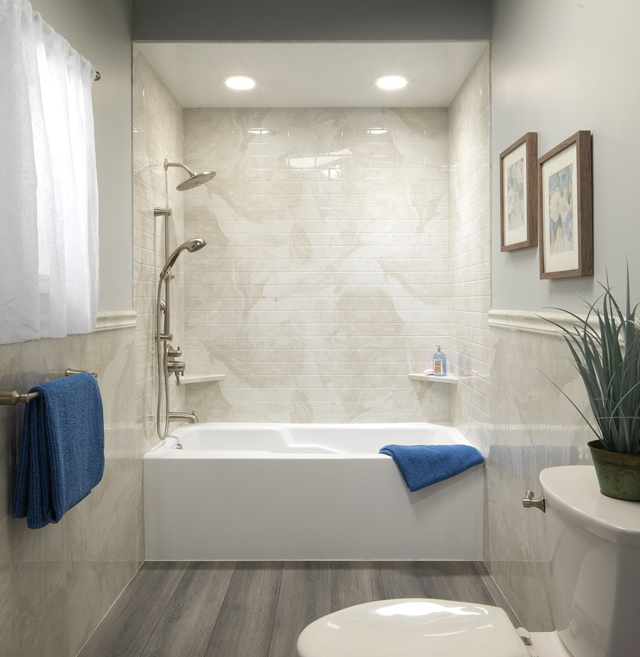 Modern bathroom with tiled shower and tub.